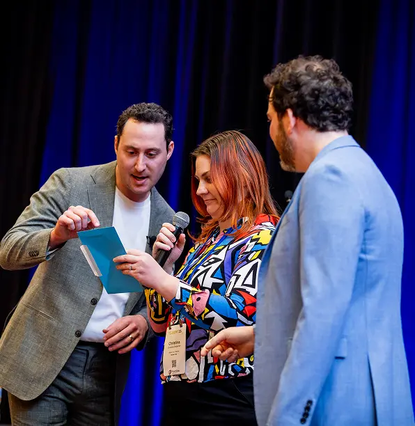 people rehearsing and reading notes to perform in the stage